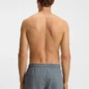 Micro-print swim trunks with logo patch