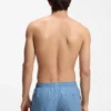Micro-print swim trunks with logo patch