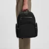 Multi-pocket backpack with leather trim Multi-pocket backpack with leather trim