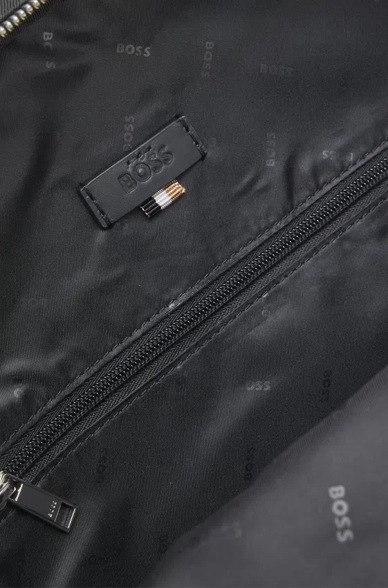 Multi-pocket backpack with leather trim Multi-pocket backpack with leather trim