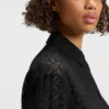 Oversized-fit blouse with burnout pattern
