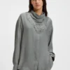 Oversized-fit blouse with fringing and logos