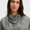 Oversized-fit blouse with fringing and logos