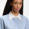 Oversized-fit blouse with stacked logos