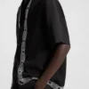 Oversized-fit shirt with embroidered pattern