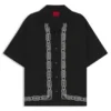 Oversized-fit shirt with embroidered pattern