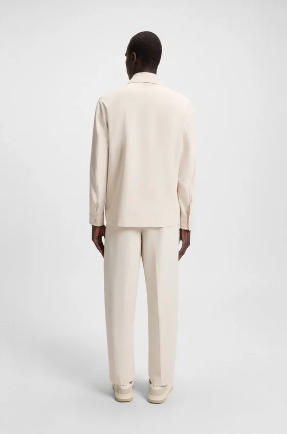 Packable relaxed-fit jacket in performance-stretch fabric Packable relaxed-fit jacket in performance-stretch fabric