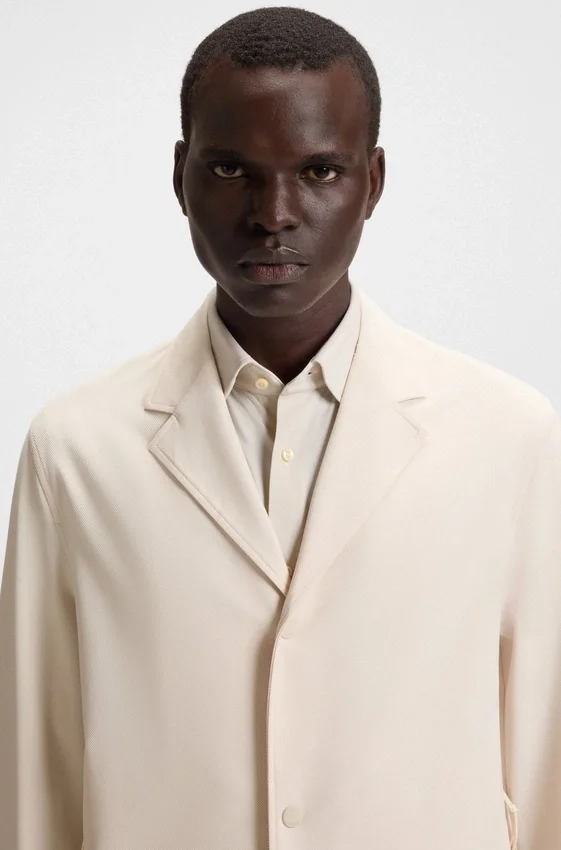 Packable relaxed-fit jacket in performance-stretch fabric Packable relaxed-fit jacket in performance-stretch fabric