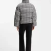 Padded jacket with houndstooth pattern