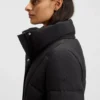 Padded jacket with metal belt detail Padded jacket with metal belt detail