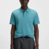 Pallas logo-detail polo shirt in cotton piqué Pallas logo-detail polo shirt in cotton piqué