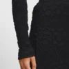 Pencil skirt with geometric plissé