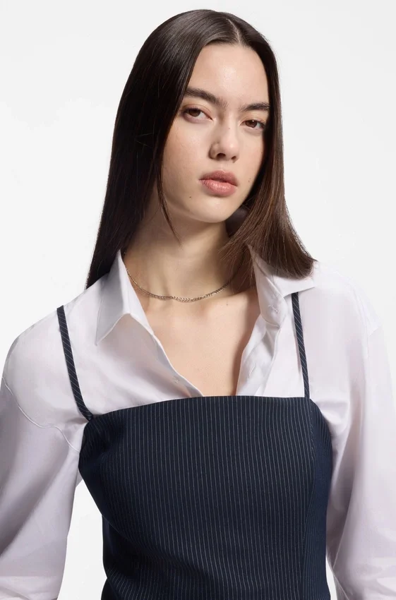 Pinstripe top with peplum hem Pinstripe top with peplum hem
