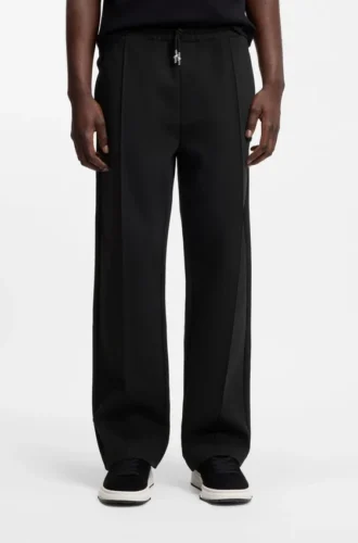 Pintuck-pleat tracksuit bottoms in a relaxed fit