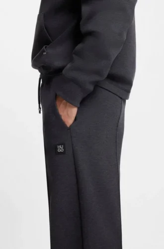 Pintuck-pleat tracksuit bottoms in a relaxed fit