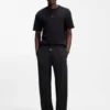 Pintuck-pleat tracksuit bottoms in a relaxed fit