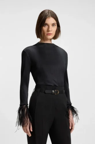 Plissé top with detachable feather cuff trims Plissé top with detachable feather cuff trims