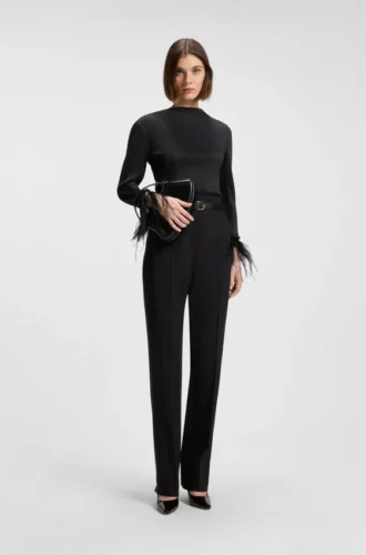 Plissé top with detachable feather cuff trims Plissé top with detachable feather cuff trims