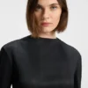 Plissé top with detachable feather cuff trims