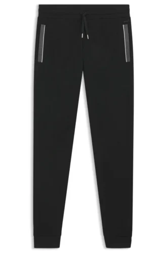 Pocket-detail tracksuit bottoms in a cotton blend