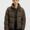 Puffer jacket with cable-knit structure Puffer jacket with cable-knit structure