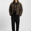 Puffer jacket with cable-knit structure Puffer jacket with cable-knit structure