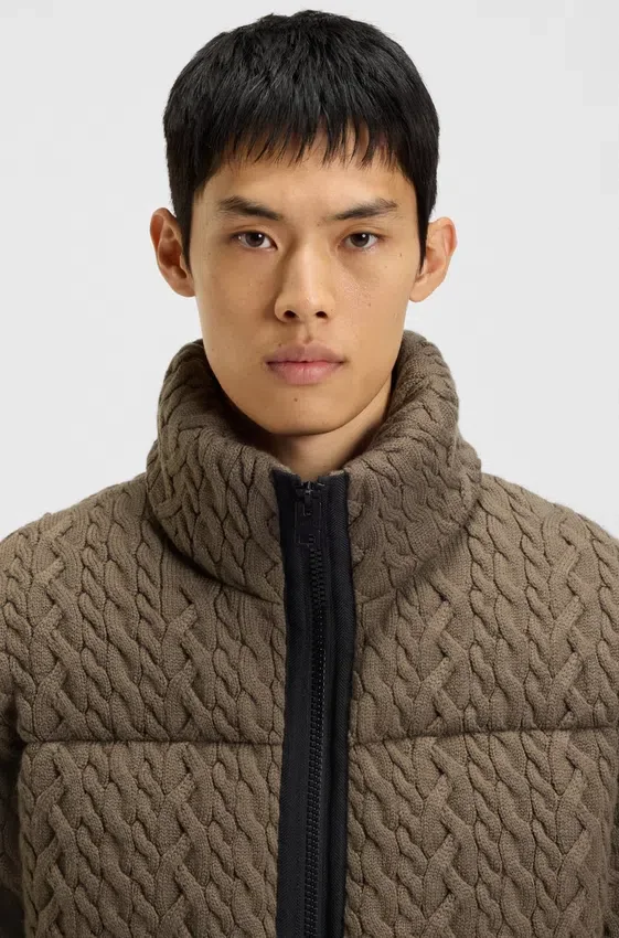 Puffer jacket with cable-knit structure Puffer jacket with cable-knit structure