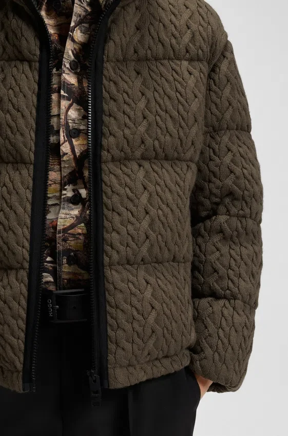 Puffer jacket with cable-knit structure Puffer jacket with cable-knit structure