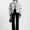 Puffer jacket with silicone logo badge