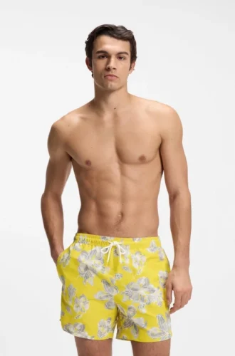 Quick-dry swim shorts with all-over print