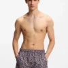 Quick-dry swim shorts with all-over print