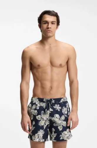 Quick-dry swim shorts with all-over print
