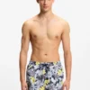 Quick-dry swim shorts with all-over print