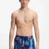 Quick-dry swim shorts with all-over print
