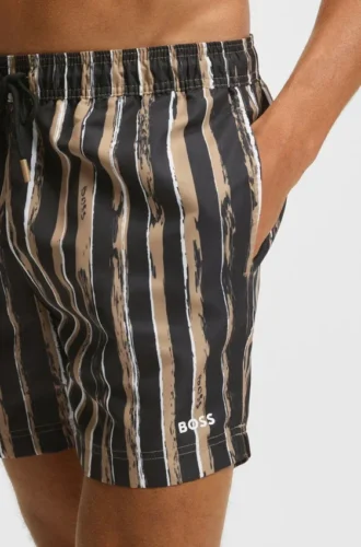 Quick-dry swim shorts with all-over print