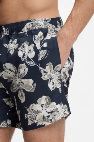 Quick-dry swim shorts with all-over print