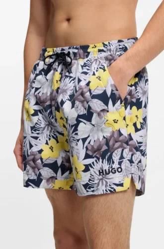 Quick-dry swim shorts with all-over print