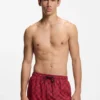 Quick-dry swim shorts with stacked-logo check print