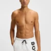Quick-dry swim shorts with vertical logo print