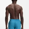 Quick-dry swim shorts with vertical logo print
