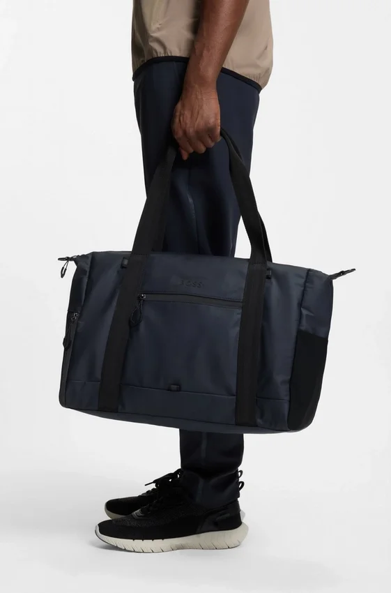 Reflective-detail holdall in faux leather Reflective-detail holdall in faux leather