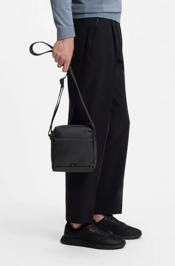 Reflective-detail reporter bag in faux leather Reflective-detail reporter bag in faux leather