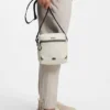 Reflective-detail reporter bag in faux leather Reflective-detail reporter bag in faux leather