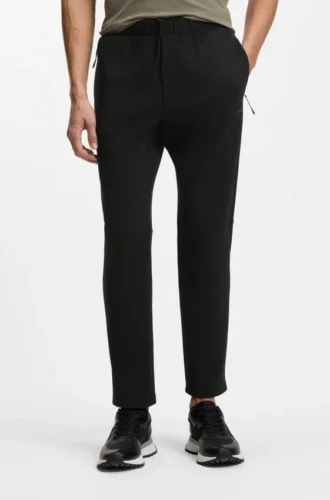 Reflective-detail tracksuit bottoms in a regular fit Reflective-detail tracksuit bottoms in a regular fit