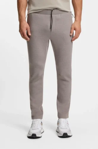 Reflective-detail tracksuit bottoms in a regular fit