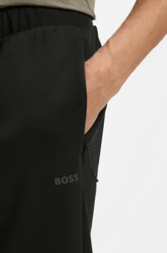 Reflective-detail tracksuit bottoms in a regular fit Reflective-detail tracksuit bottoms in a regular fit