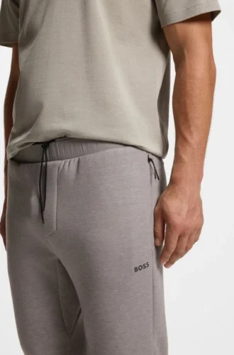 Reflective-detail tracksuit bottoms in a regular fit