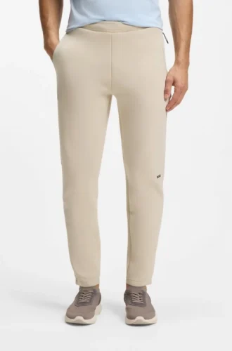Reflective-graphic tracksuit bottoms in a cotton blend