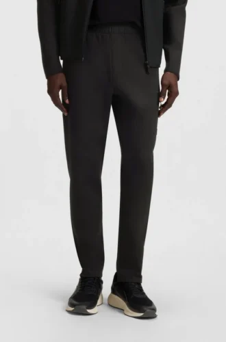 Regular-fit tracksuit bottoms with decorative reflective details