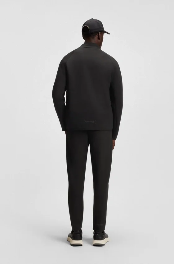 Regular-fit tracksuit bottoms with decorative reflective details Regular-fit tracksuit bottoms with decorative reflective details